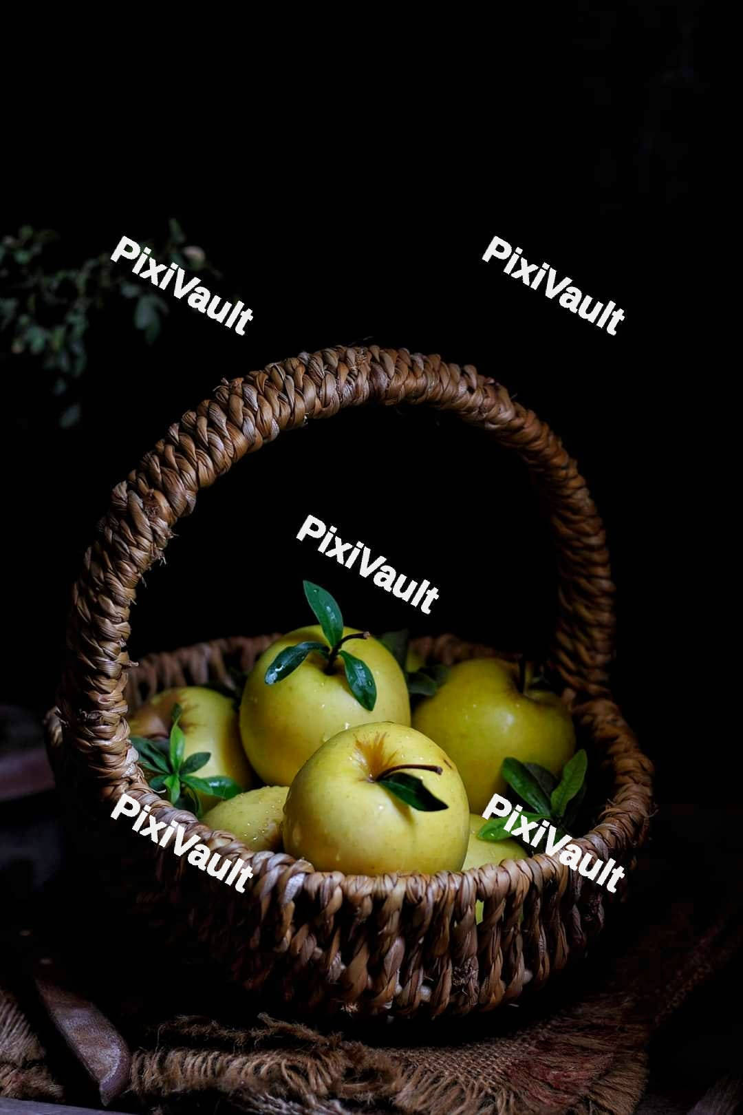 Straw basket with apples